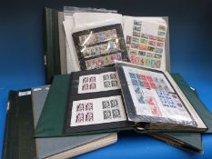 Four albums and a binder of France and Colonies stamps,