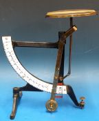 An unusual dual scale pendulum scale marked concav, the scales for 4oz and 18oz,