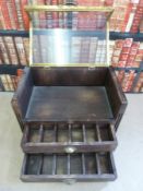 A haberdashery shop counter top display cabinet with lift up glazed top and two doors below (W67cm