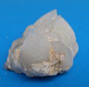A small geological sample of pyramid crystals,
