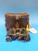 A leather cased pair of Carl Zeiss Jena Deltrentis 8x30 binoculars,