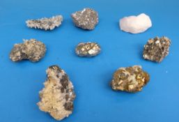 Three bags of geological samples, one containing very small samples with gold coloured stone,