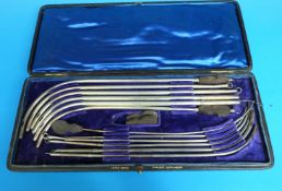 A cased set of 'Down Bros opposite Guys Hospital' hallmarked silver catheters, 12 in total,