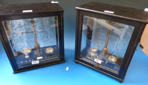 A glass cased set of D.