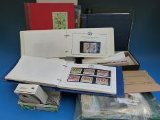 A large quantity of presentation packs, first day covers,