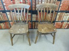 A pair of 19thC elm seated chairs