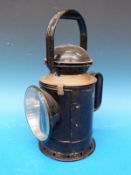 A railway tri-colour hand lamp