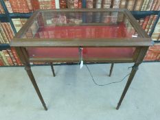 An antique style mahogany glass or silver cased display table on fluted tapered legs (H71 x L47 x