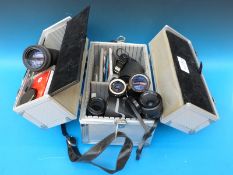 A hard fold out carry case containing camera lenses, RMC Takina 100-300mm,