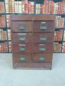 A mahogany haberdashery unit of eight straight drawers (H83 x W61 x D57cm)