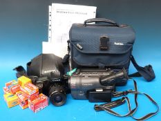 A Canon EOS 1000F SLR camera, films,