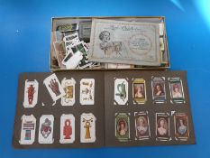 A collection of cigarette cards
