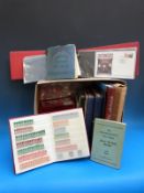 A box of assorted stamp albums, stockbooks, used Royal Wedding Album pages, postcards, P.H.Q.
