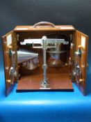 A Reverifications Ltd County Borough of Solihull 7lb beam scale, with various pans,