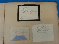 An interesting collection of 19thC autographs and clipped signatures in a leather bound album,
