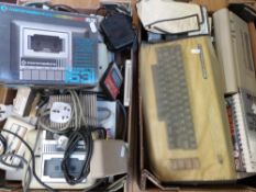 Two Commodore Vic 20 colour computers with related items and some Commodore 64 related items