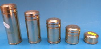 A run of five cylindrical brass troy weights,