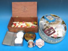 A quantity of buttons, tiddlywinks,