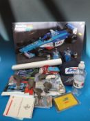Two Formua 1 caps including Ferrari and Benetton freestanding promotional picture, key rings,
