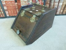 An oak coal box together with a copper coal scuttle and other metal ware