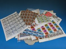 A large quantity of pre-decimalisation mint QEII GB sheets of stamps