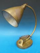 An Art Deco adjustable brass desk lamp