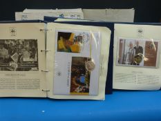 Six coin/stamp albums celebrating the Queen's Golden Jubilee