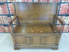 An oak monk's bench (H144 x D49 x W99cm)