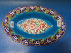 An oval Longwy bowl with enamel decoration