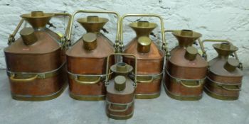 A set of six County Borough of Solihull copper and brass Chekpump petrol measures contained within