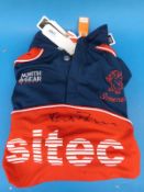 A Somerset cricket shirt signed by Keith Persons