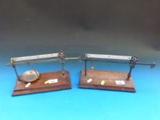 Two pairs of Avery Ltd cantilever beam scales