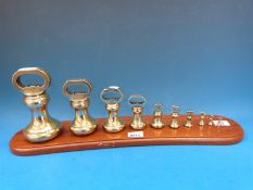 A run of 10 Avery bottle weights, 7lb down to 1/4 oz, 8oz and upwards stamped Avery,