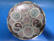 A large Persian or Moroccan charger in an Islamic style pattern