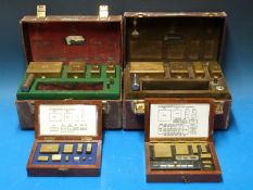 Two cased sets of brass standard weights, 4lb down to 1/2 dr,