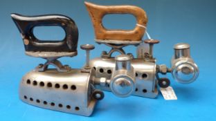 Two nickel plated spirit fired irons,