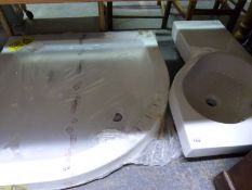 A quadrant shower tray (900 x 900) and a bespoke modern sink unit