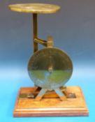 An unusual Marion & Co pendulum type parcel scale, the dial reading up to 1 stone and 7 lb,