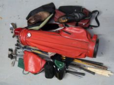 A collection of golf clubs to include Ping Eye 2, Callaway King, Cobra, Wilson,