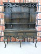 An oak Welsh dresser with three drawer base,