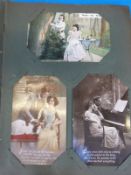 A vintage postcard album containing 68 Edwardian romantic postcards (green album)