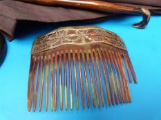 A 9ct gold mounted horn hair comb,