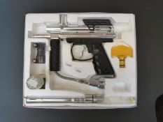 An Icon X semi-automatic paint ball gun in original box