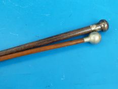 A hallmarked silver topped swagger stick and another for Canford School O.T.