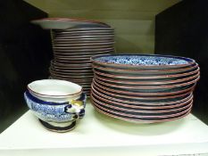 A collection of Royal Worcester dinnerware in Royal Lily pattern comprising 13 dinner plates,
