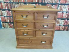 A pine chest of drawers with blue and white ceramic handles (W110 x D50 x H114cm)