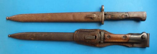 A Czechoslovakian bayonet marked E27 and CSZ, in scabbard,