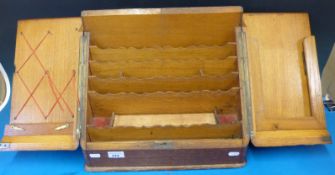 An oak two-door desk-top stationery cabinet with fitted interior