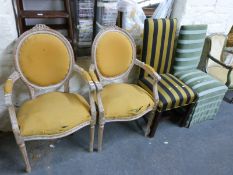 Two limed wooden armchairs together with seven various other chairs