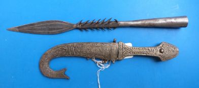 A small Indian kukri knife with fish tail style scabbard,